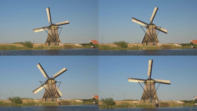 特写: 美丽的河岸上令人惊叹的古老传统荷兰风车