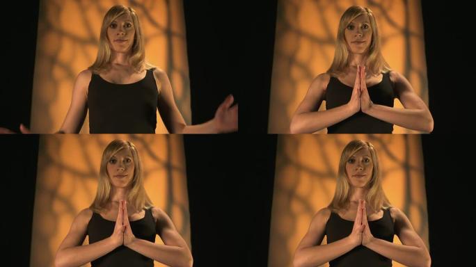 高清: 双手合十冥想的女人