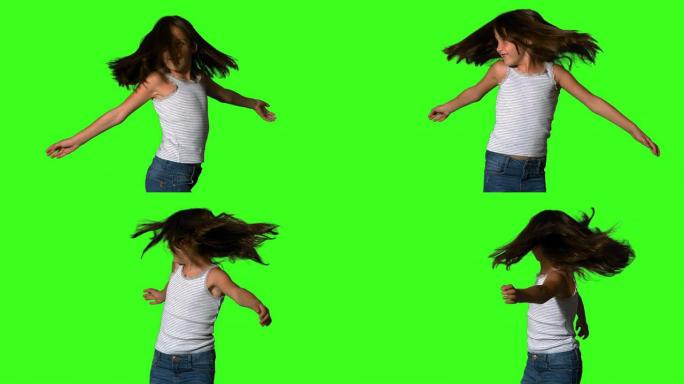 小女孩在绿色屏幕上旋转