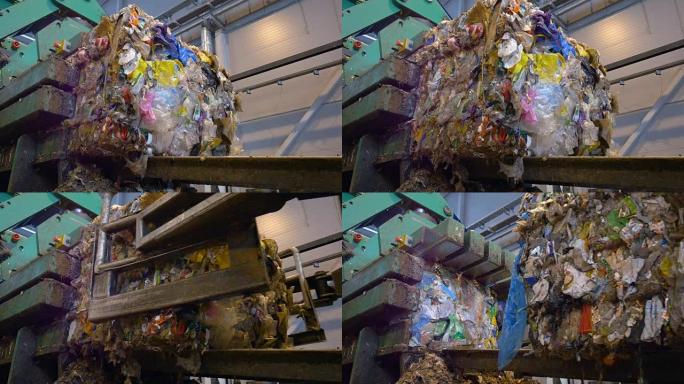 垃圾在回收厂堆积如山。延时。