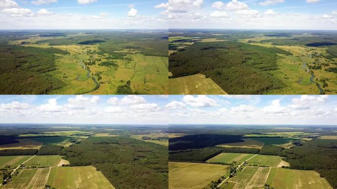 无人机向左旋转到乡村天际线。平移360令人难以置信的自然，森林，田野和河流的空中拍摄。4K
