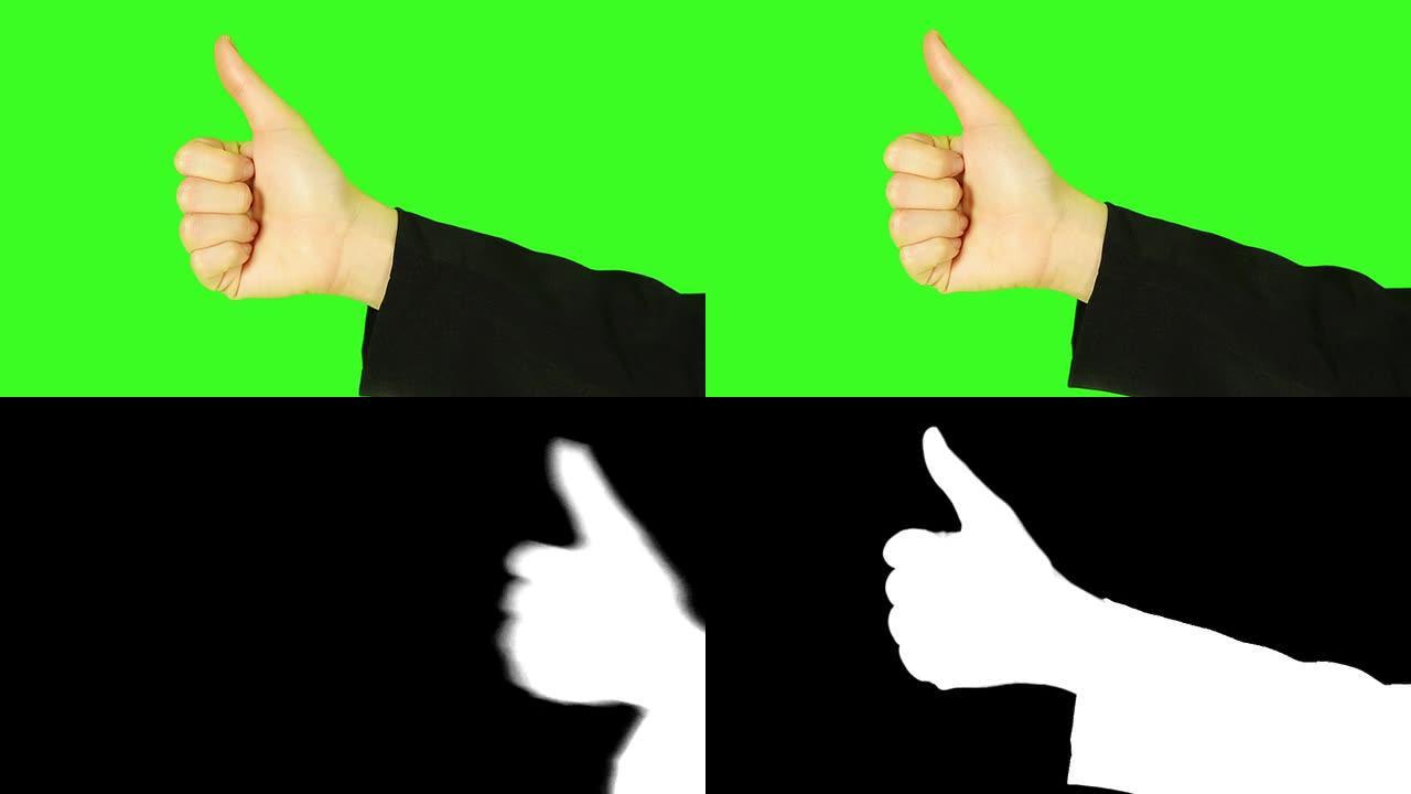 绿色屏幕背景下的人手竖起大拇指