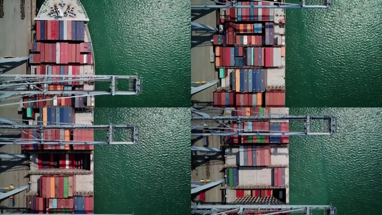 工业起重机在货船上装载集装箱，架空