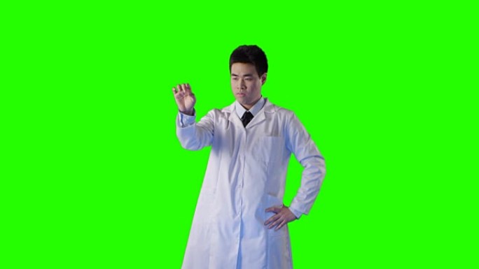从事触摸屏工作的亚洲科学家。绿屏