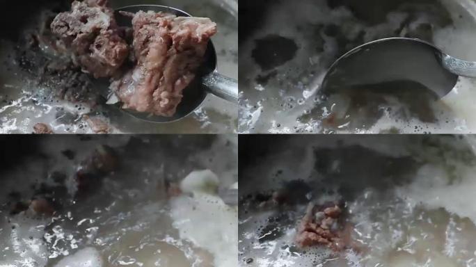 汤特写自制煮沸，猪肉汤正在煮沸，汤在锅中煮沸