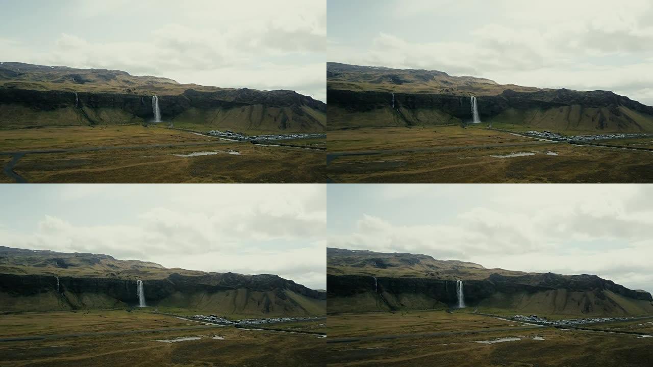 山谷和塞尔贾兰德斯福斯瀑布的鸟瞰图。直升机飞越冰岛著名的旅游胜地