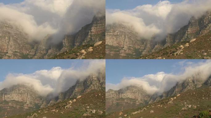 乌云笼罩着南非开普敦的12个使徒山脉