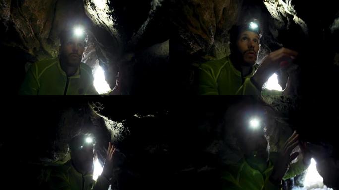 探索黑暗洞穴的男性徒步旅行者4k