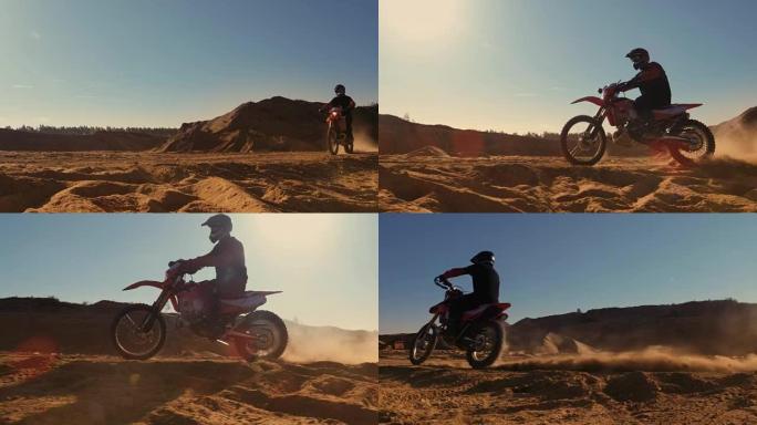 侧面镜头的专业摩托车越野赛摩托车骑手驾驶在沙丘和更远的越野轨道。这是《日落》，赛道上布满了烟雾。