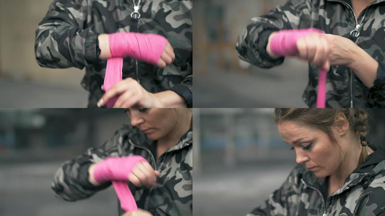 女人在锻炼前戴上手包