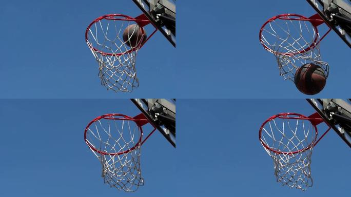 在篮球架上得分。慢动作镜头。