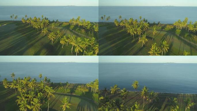 空中飞越热带岛屿专属的金色照明海滨高尔夫球场