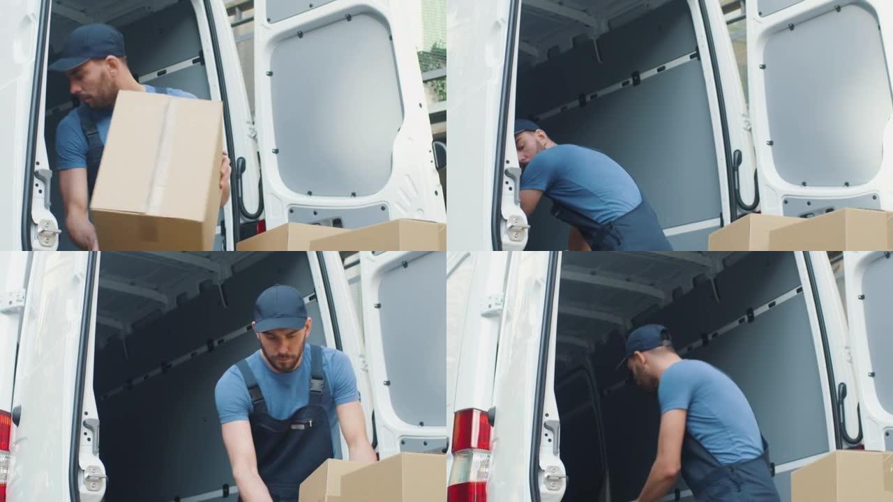 坚强的集中送货员用纸板箱装载货车。