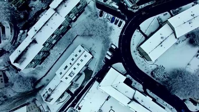 Arial shot of snow covered village in wintertime
