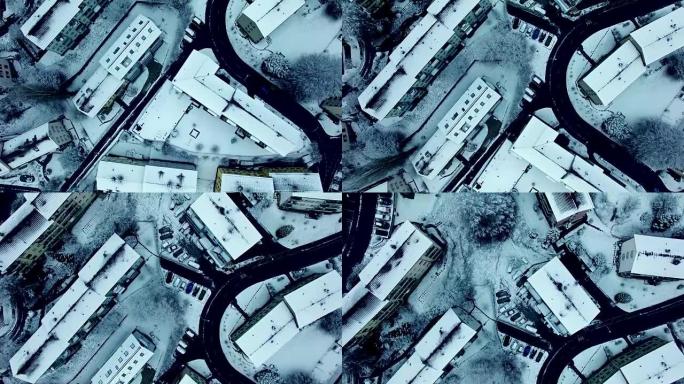 Arial shot of snow covered village in wintertime