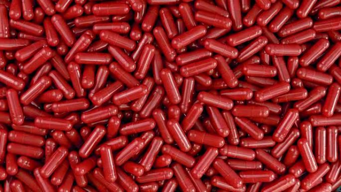 一堆红色健康胶囊