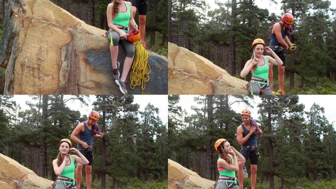 微笑的夫妇准备攀岩