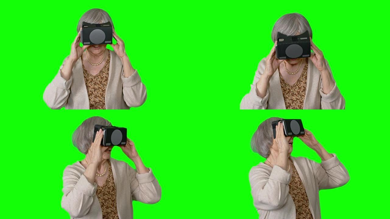 对虚拟现实感到惊讶的老年妇女
