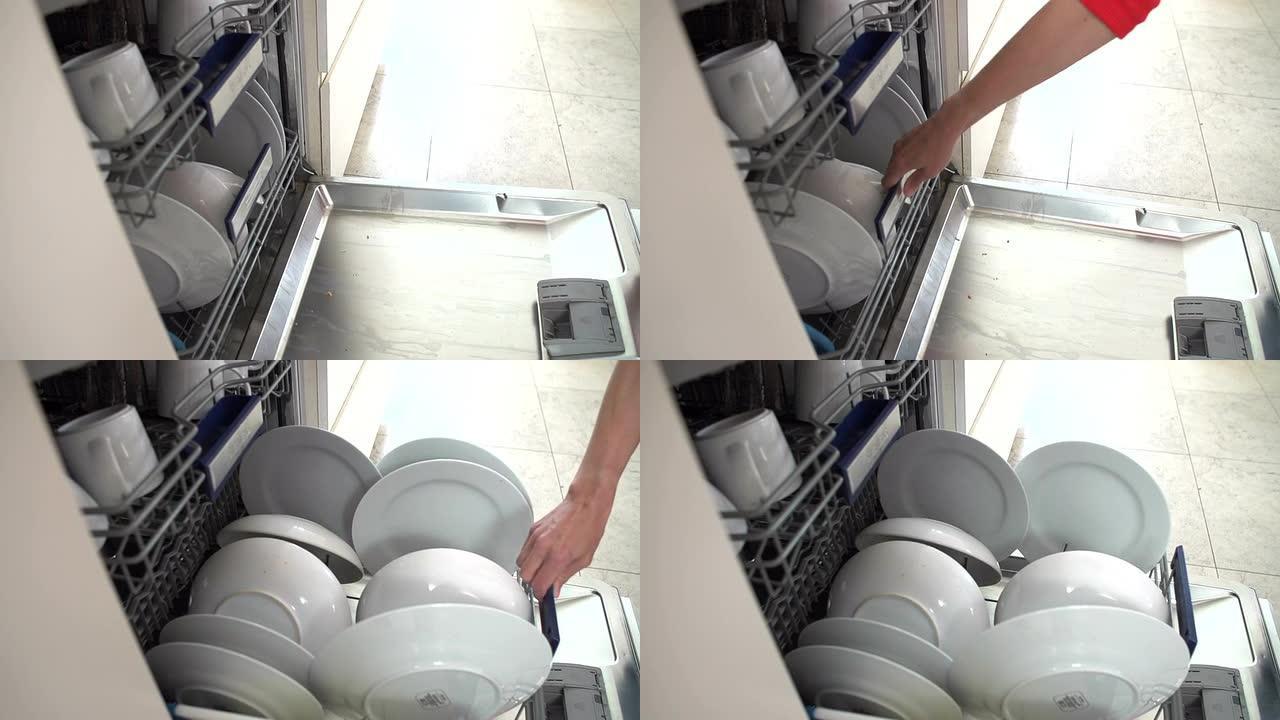 女性排空洗碗机的慢动作序列
