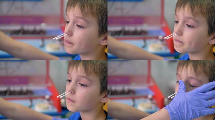 鼻腔手术过程中男孩的脸部特写