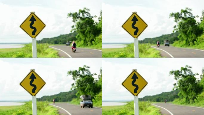 摩托车和汽车行驶的弯道警告标志