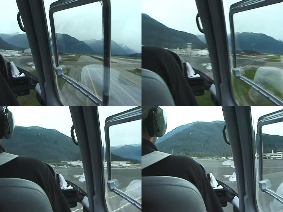 直升机在机场降落：驾驶舱视图