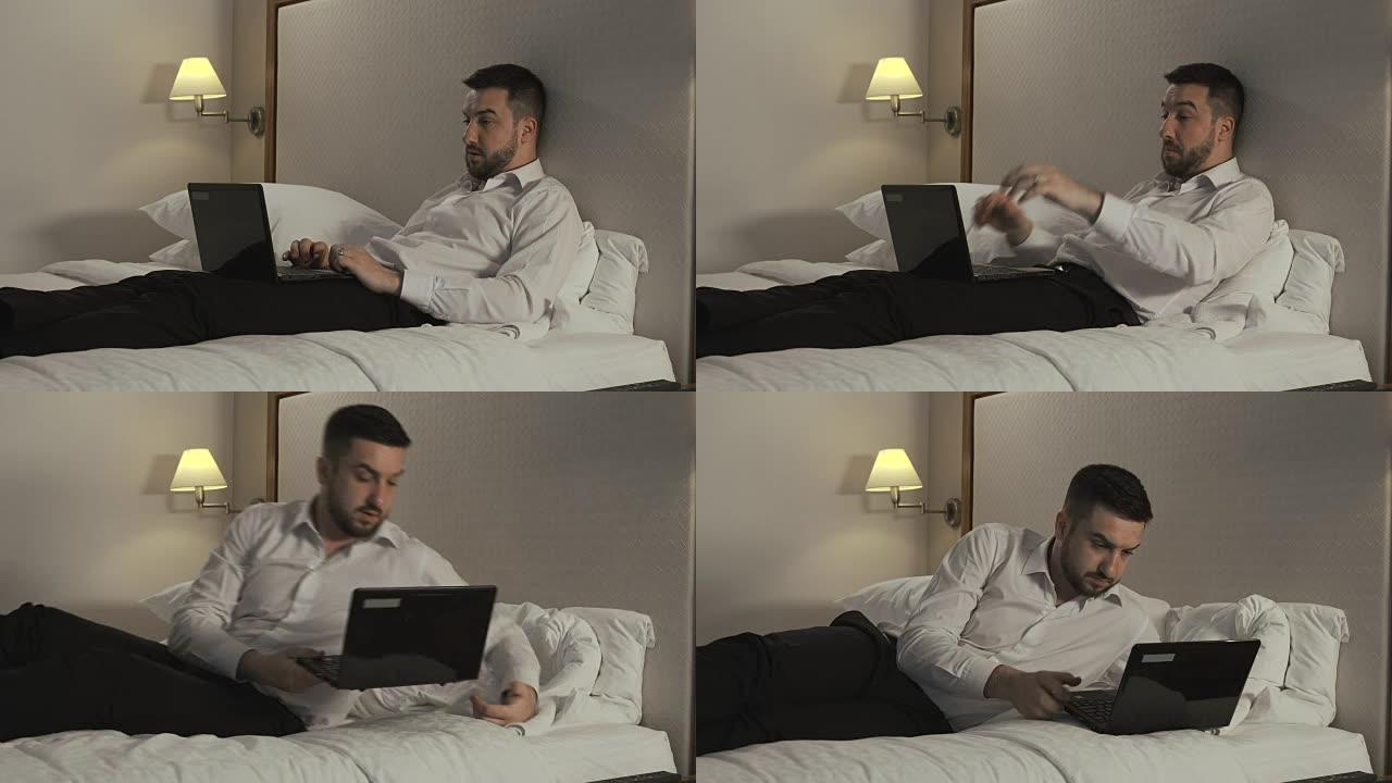 商人在床上用笔记本电脑工作