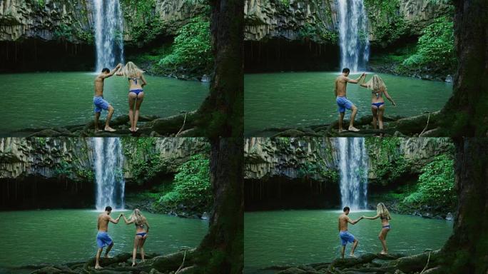 探索丛林瀑布的夫妇