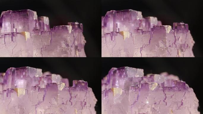 特写半贵萤石矿物的迷人半透明紫罗兰色棱镜