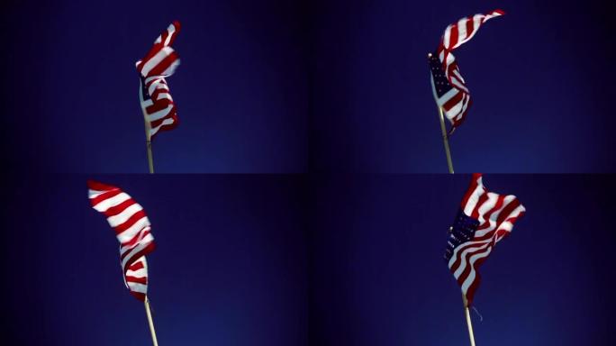 美国国旗迎风飘扬。背景是晴朗的天空