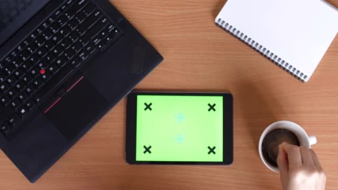 Top view of Using digital tablet,Green screen