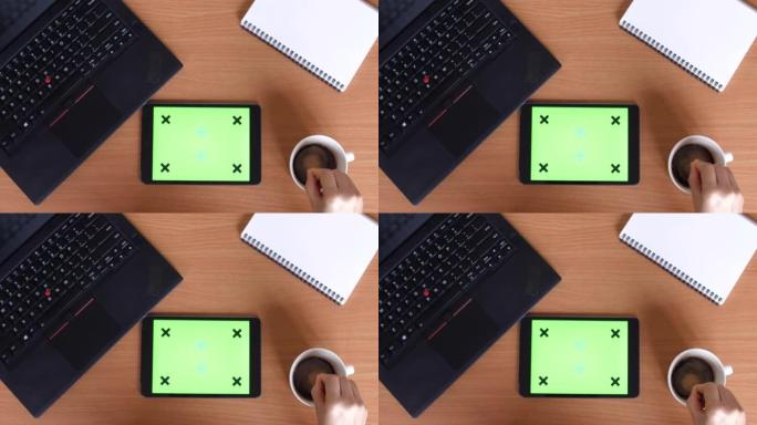 Top view of Using digital tablet,Green screen