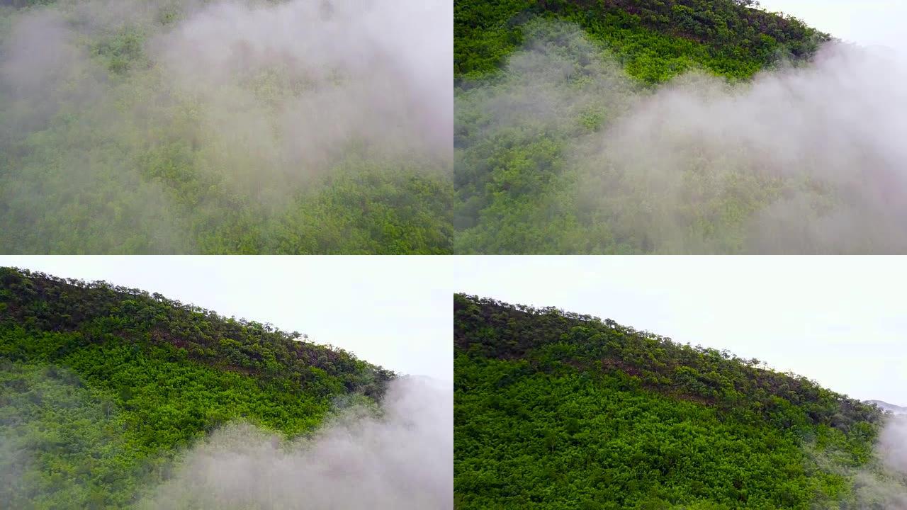 在泰国Ratchaburi省，4k空中拍摄的雾气滚过山脉。