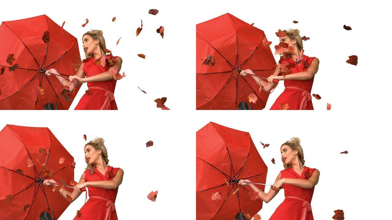 漂亮的魅力女人在白色屏幕上拿着一把破雨伞