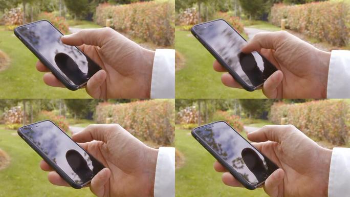 使用智能手机的人的特写