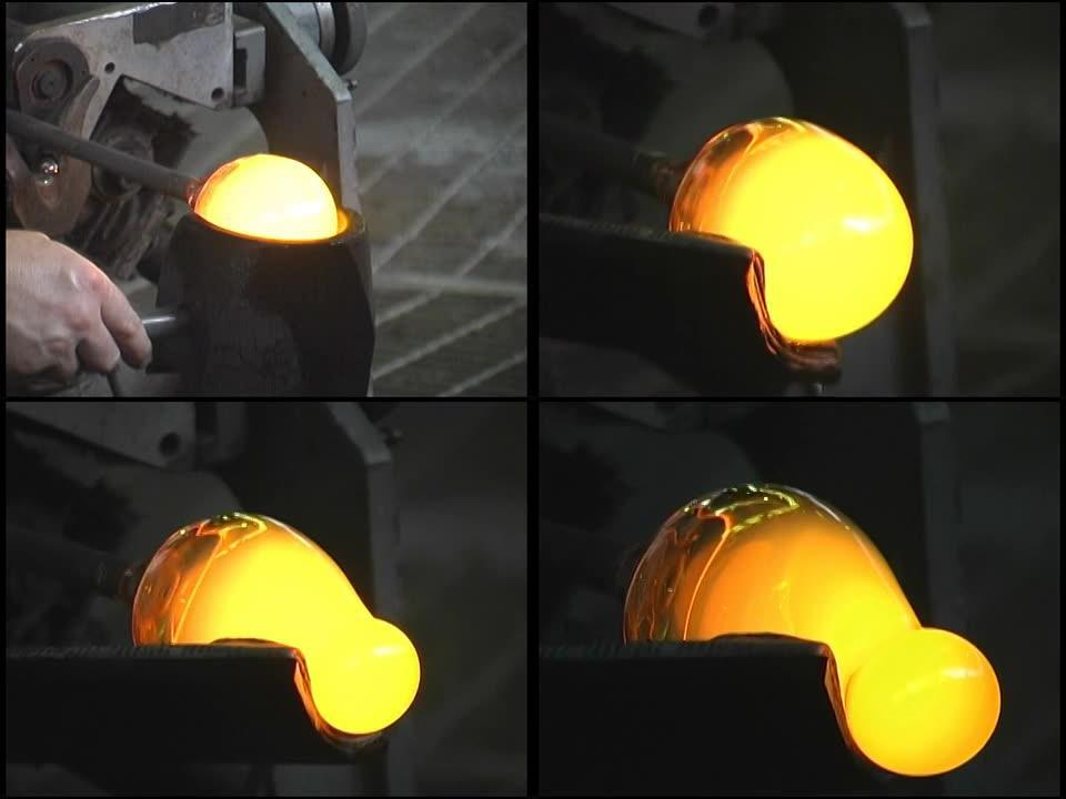 吹玻璃：热液球在铸铁模具中旋转