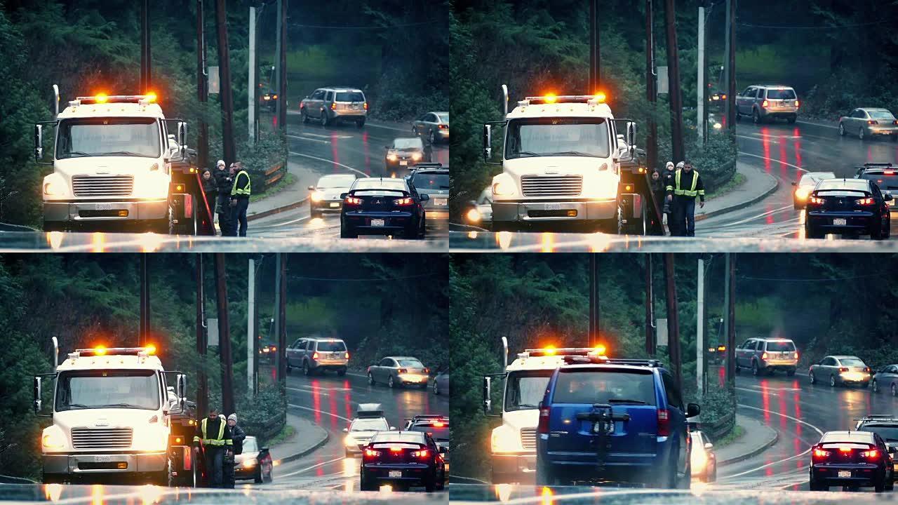 雨中繁忙道路上的汽车故障服务