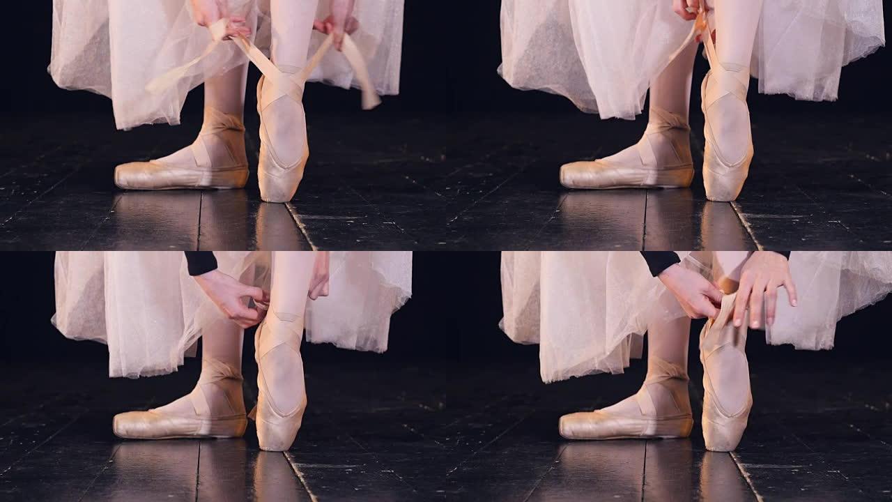 芭蕾舞鞋的特写镜头被绑起来了。
