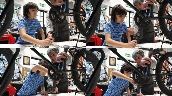 爸爸在一家家庭企业的自行车维修店教儿子如何对自行车进行维护