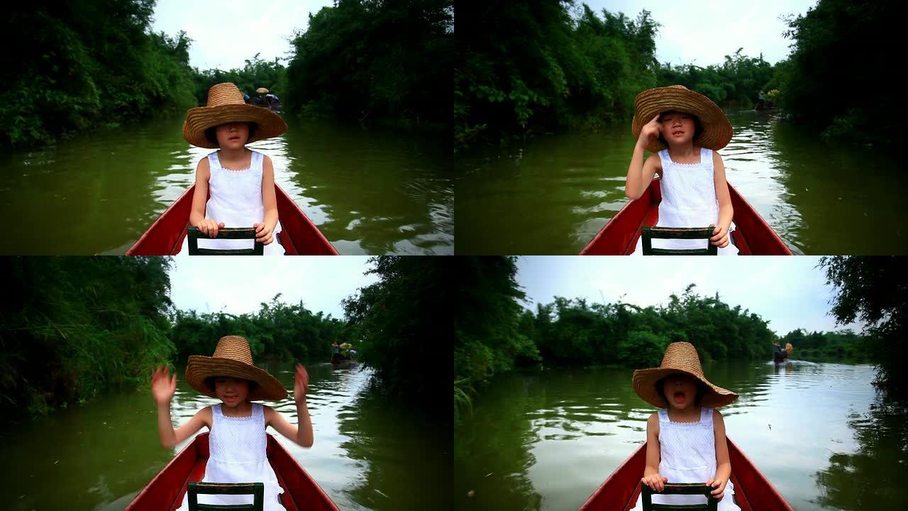 女孩在湿地上的船上放松