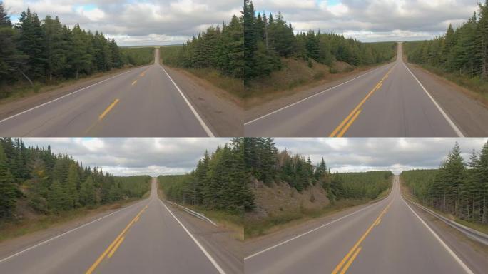 POV: 在空旷的州际公路上行驶，穿过加拿大茂密的北方森林