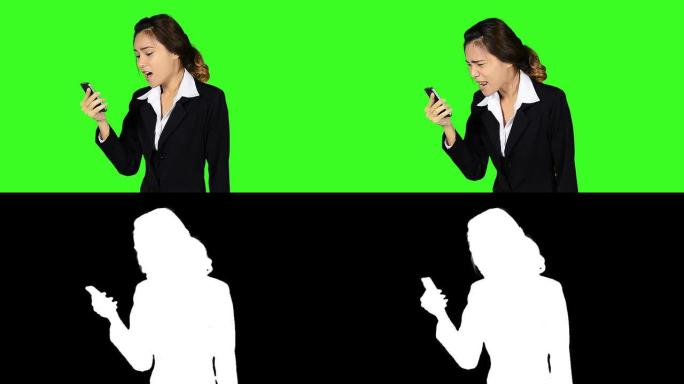 绿色屏幕背景下的商务女性在电话中争吵