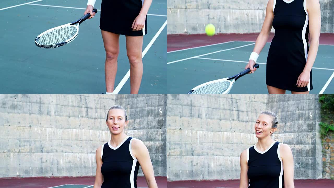 微笑的女网球运动员在球场上用球拍
