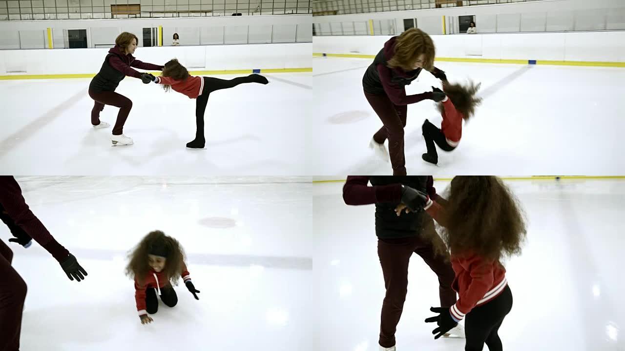 专业女教练在溜冰场训练女孩