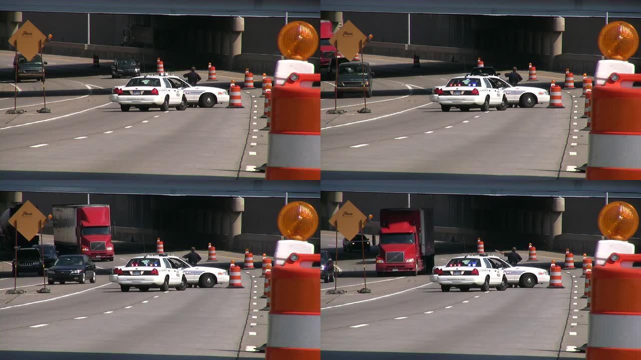 警察因车祸堵塞了高速公路。