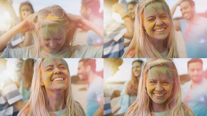一个美丽的金发女孩的特写肖像和她的朋友们一起跳舞庆祝胡里节。她的脸上和衣服上布满了五颜六色的粉末。