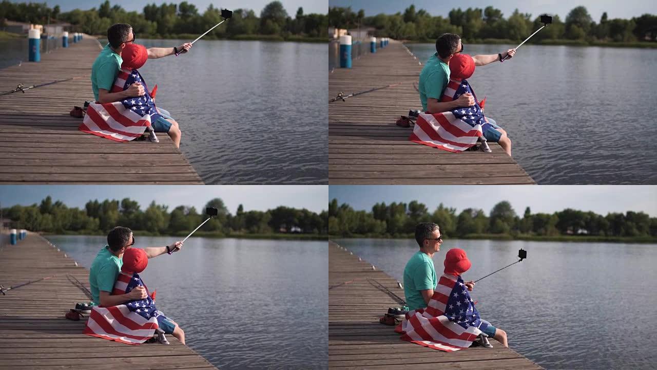 父亲和儿子与美国国旗合影