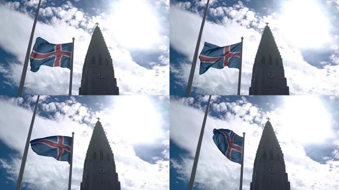 冰岛雷克雅未克美丽的Hallgrimskirkja教堂的美丽景色和飘扬的国旗