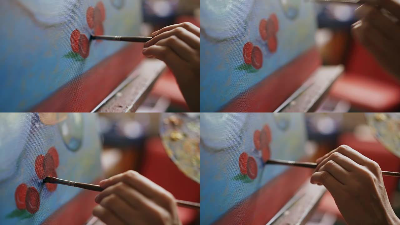 艺术工作室画布上画笔画静物画艺术家女人的手的特写