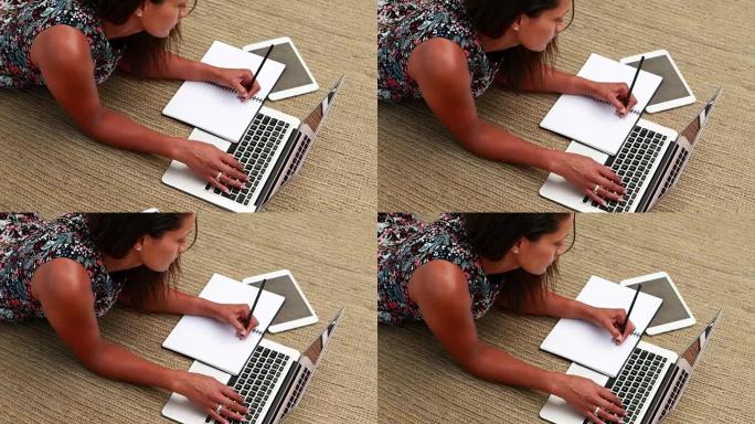女性高管在写日记时使用笔记本电脑4k